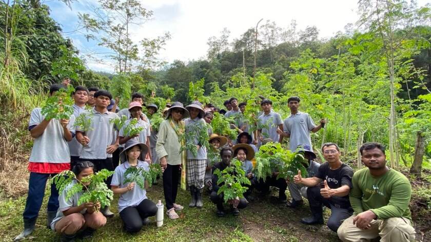 Aunty Mohana Gill with Dignity College students in the Moringa mini forest at Dignity Farm Academy, Bentong