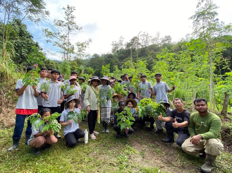 Aunty Mohana Gill with Dignity College students in the Moringa mini forest at Dignity Farm Academy, Bentong