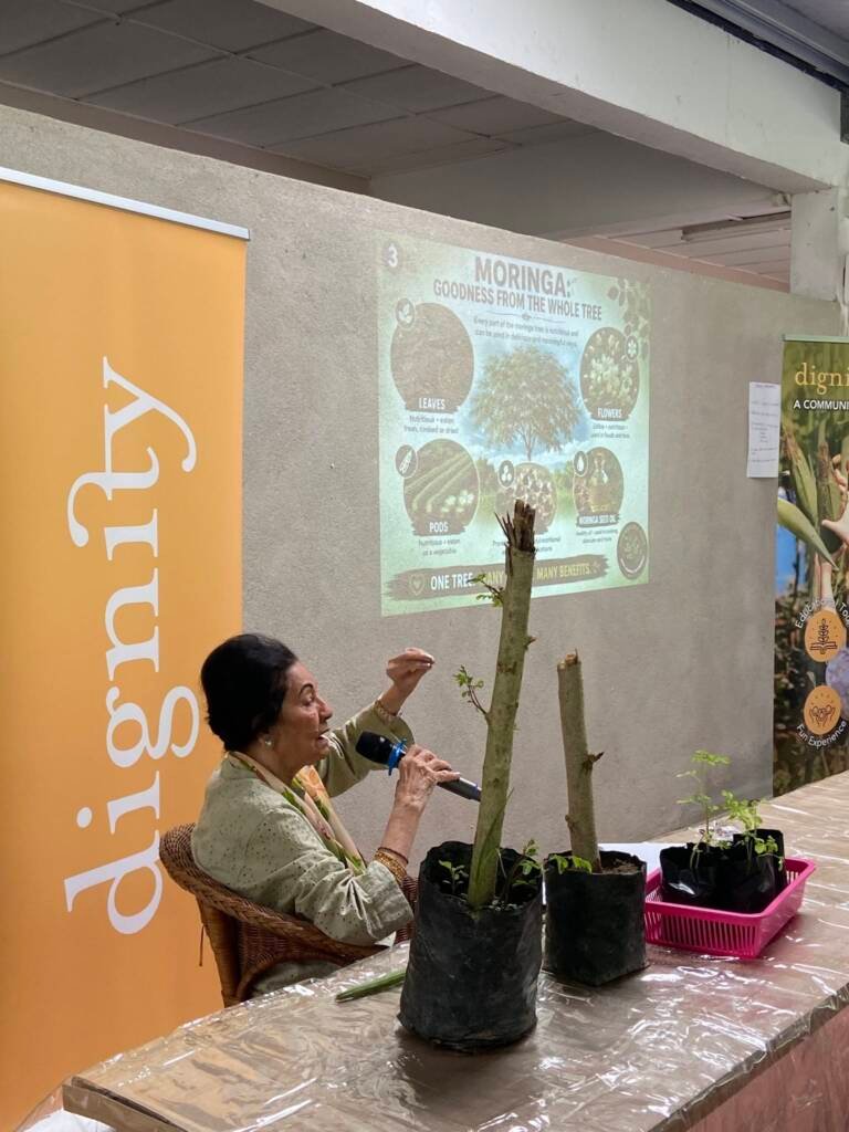 Aunty Mohana sharing the story of Moringa with the students