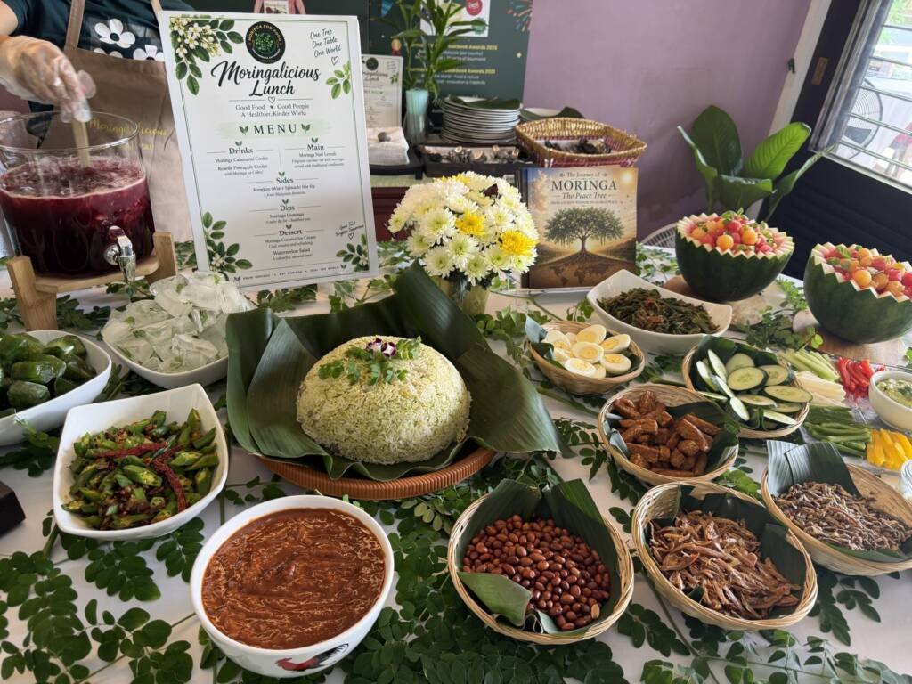 The Moringalicious Lunch spread with moringa dishes, drinks and the lunch menu