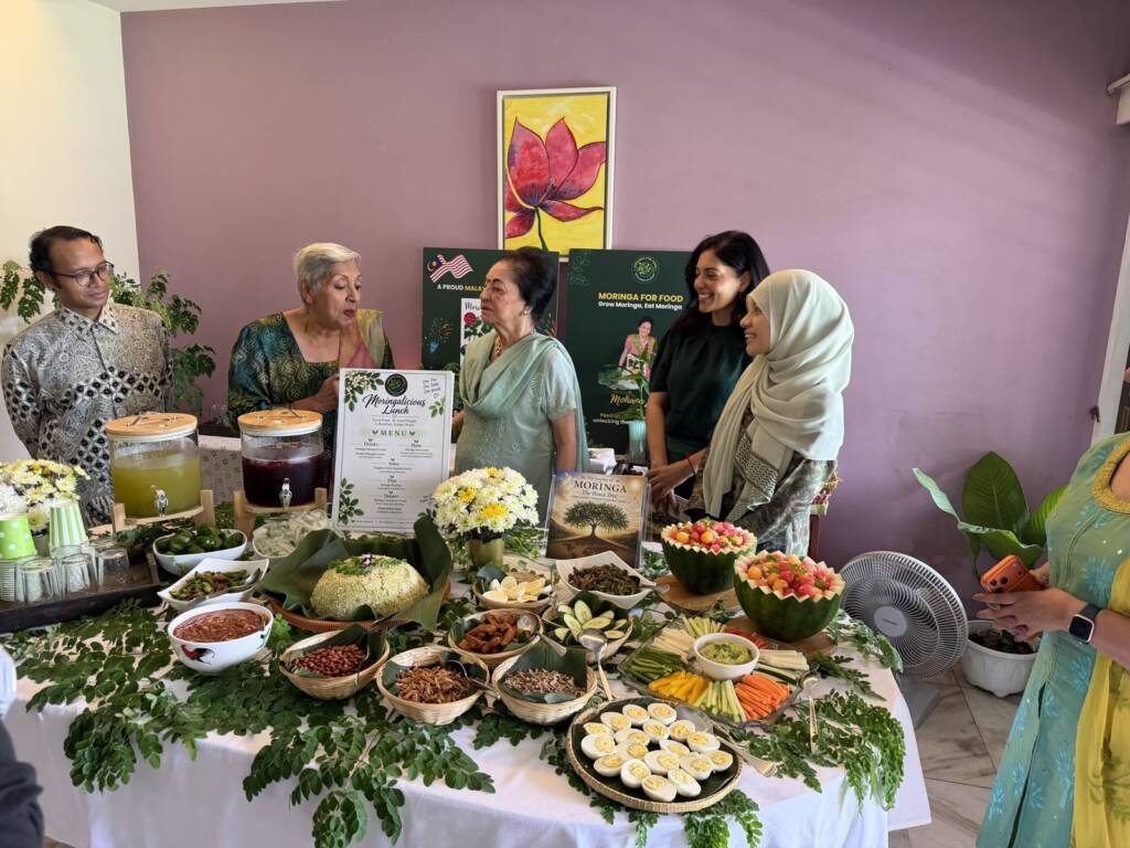 Guests enjoying the moringa dishes at the Moringalicious Lunch